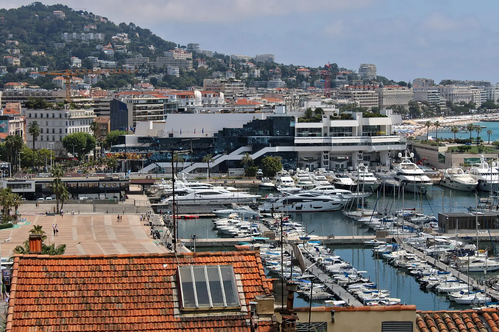 Palais des Festivals in Cannes seen above the marina and hillside