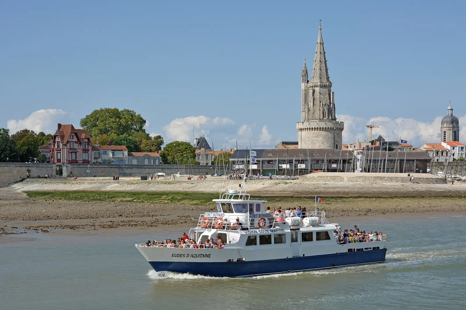 Ferry entering the old harbour of La Rochelle beneath the Lantern Tower